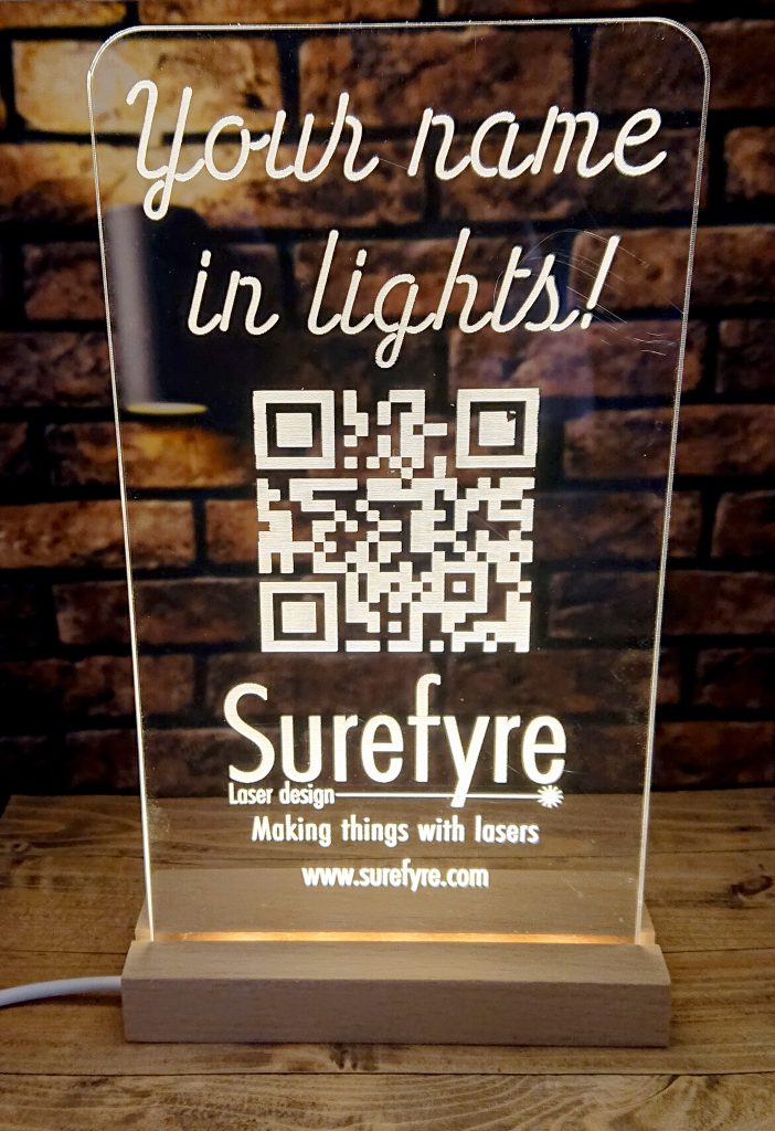 Surefyre illuminated acrylic sign
